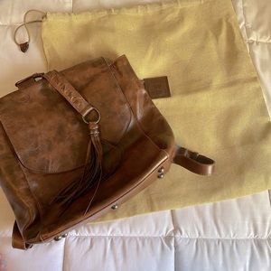 King ranch saddle shop braided tassel backpack